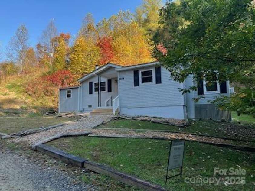 530 Rebel Ridge Road, Marshall, NC 28753.  MLS# CAR4280737, YatesRealty ID 6228. Gorgeous Fall color