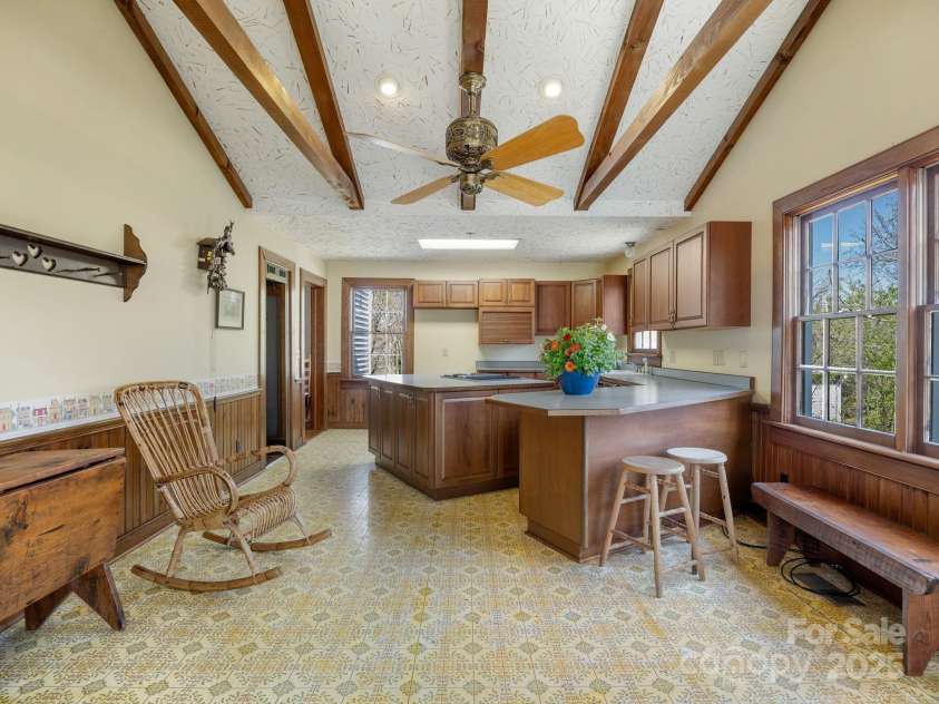 44 Bickford Avenue, Tryon, NC 28782.  MLS# CAR4245454, YatesRealty ID 6231. Kitchen view from breakfast room