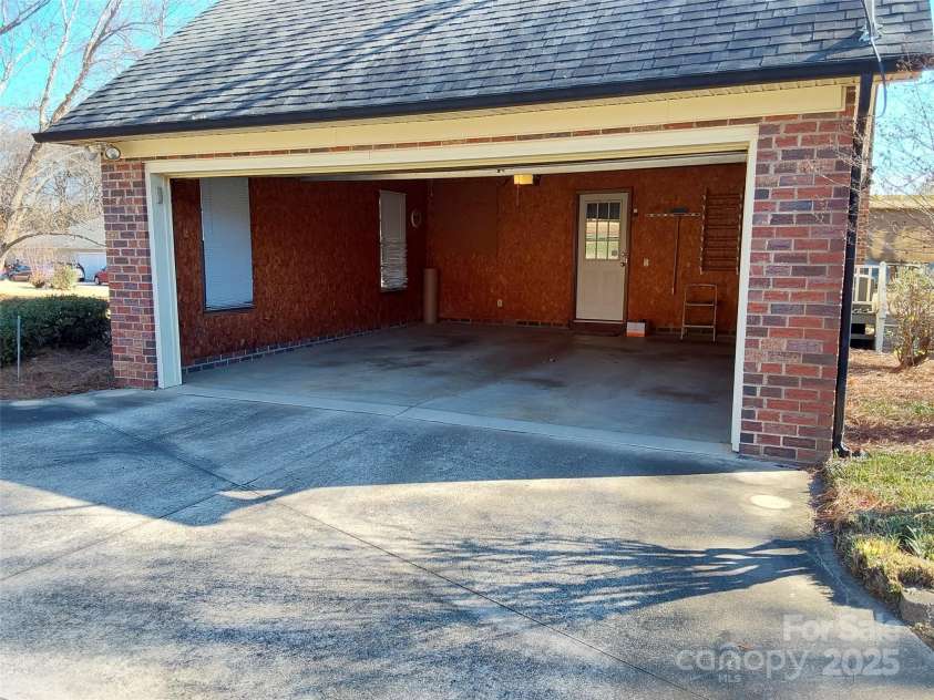 4178 Morris Burn Drive, Concord, NC 28027.  MLS# CAR4325697, YatesRealty ID 6235. Inside of the attached garage