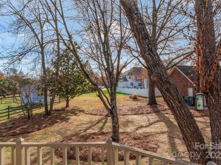 4178 Morris Burn Drive, Concord, NC 28027.  MLS# CAR4325697, YatesRealty ID 6235. Large wooded back yard.