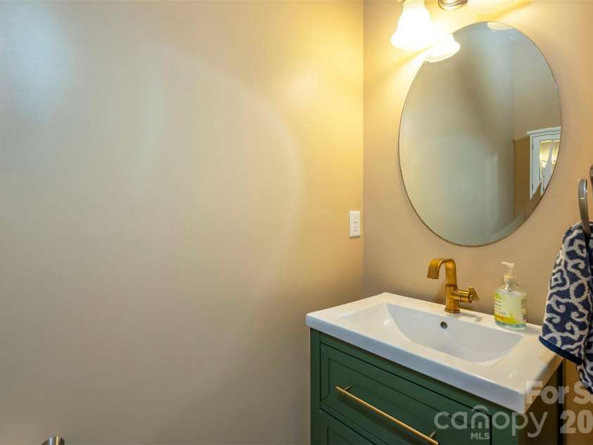 53 Stone River Drive, Asheville, NC 28804.  MLS# CAR4342463, YatesRealty ID 6239. Downstairs Half Bath
