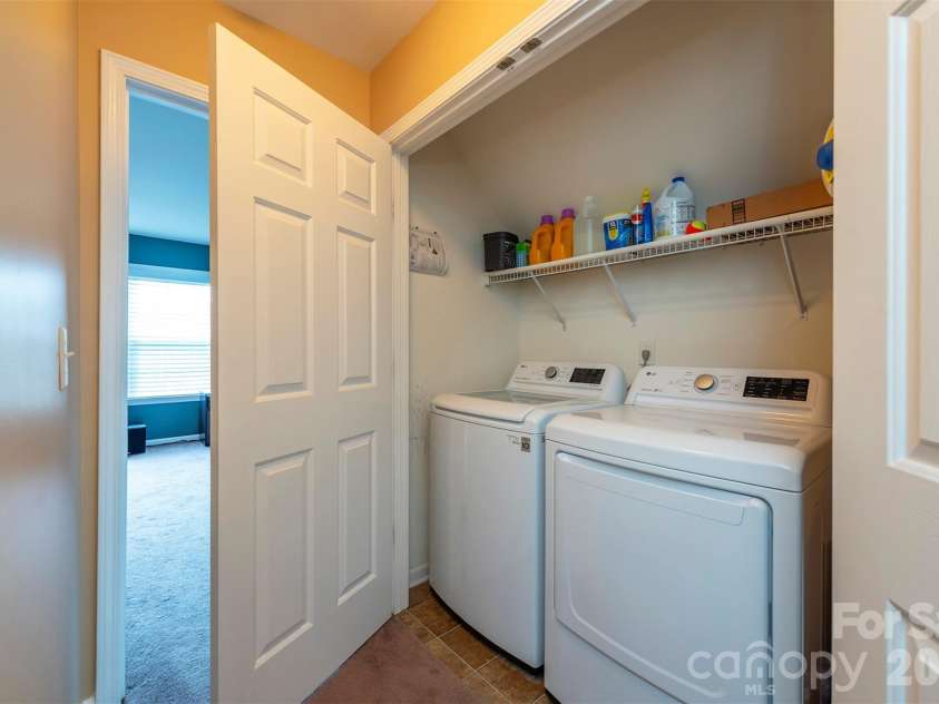 53 Stone River Drive, Asheville, NC 28804.  MLS# CAR4342463, YatesRealty ID 6239. Upstairs Laundry