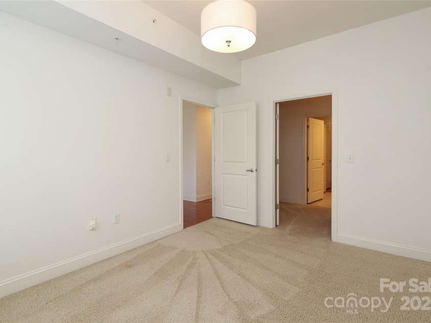 721 Governor Morrison Street, Charlotte, NC 28211.  MLS# CAR4253378, YatesRealty ID 624. 2nd bedroom with walk-in closet