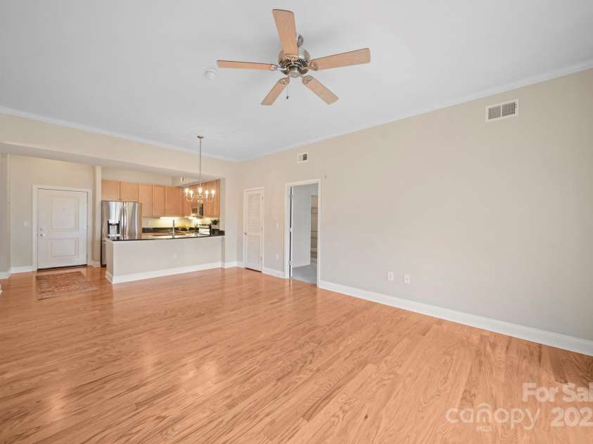 721 Governor Morrison Street, Charlotte, NC 28211.  MLS# CAR4316413, YatesRealty ID 624. Living Room, Dining Room, Kitchen