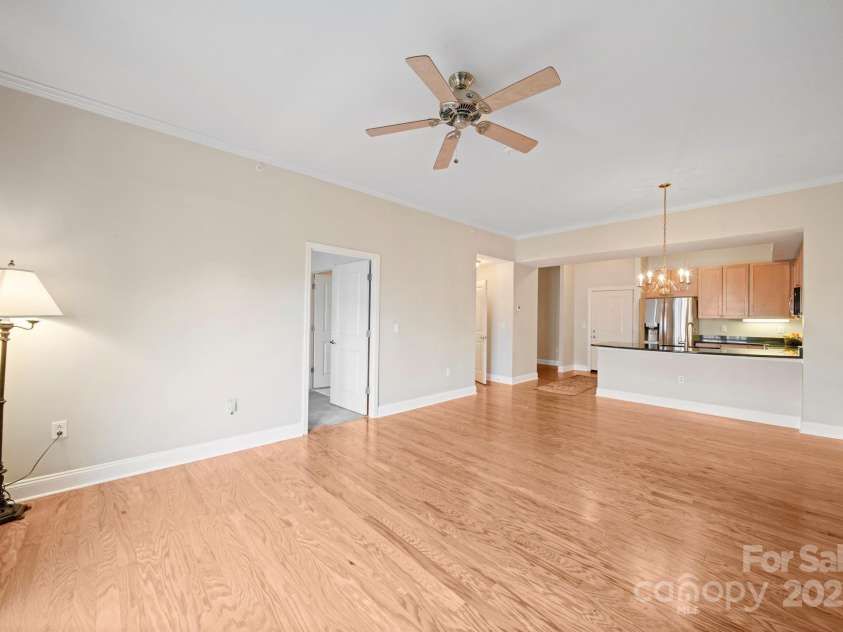 721 Governor Morrison Street, Charlotte, NC 28211.  MLS# CAR4316413, YatesRealty ID 624. Living Room, Dining Room, Kitchen