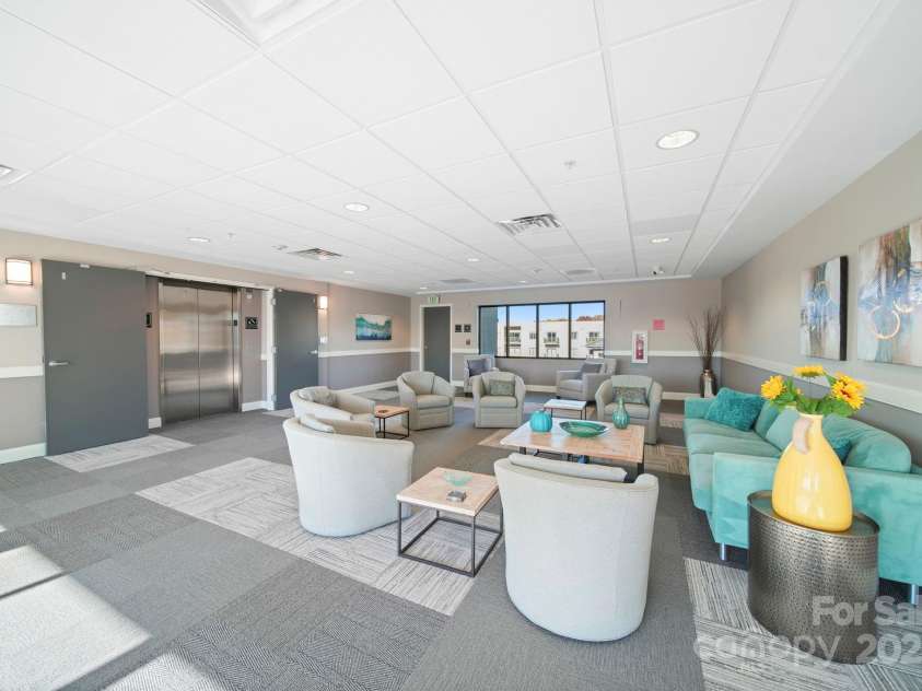721 Governor Morrison Street, Charlotte, NC 28211.  MLS# CAR4316413, YatesRealty ID 624. Seating Area by the elevators 