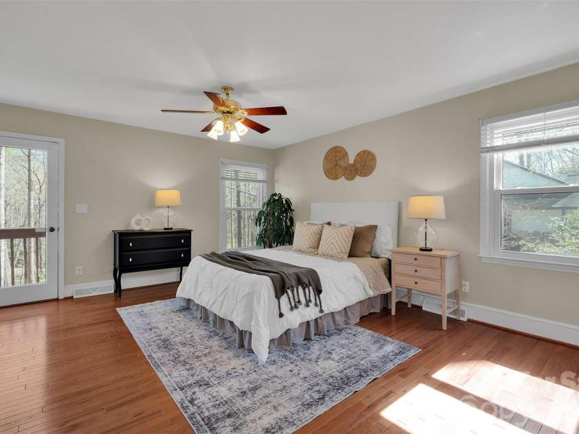 10311 Stonemede Lane, Matthews, NC 28105.  MLS# CAR4359875, YatesRealty ID 6244. Primary suite with balcony overlooking backyard