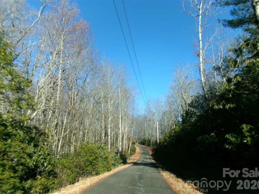 300 Serenity Trail, Rosman, NC 28772.  MLS# CAR4343470, YatesRealty ID 6245. Long paved driveway