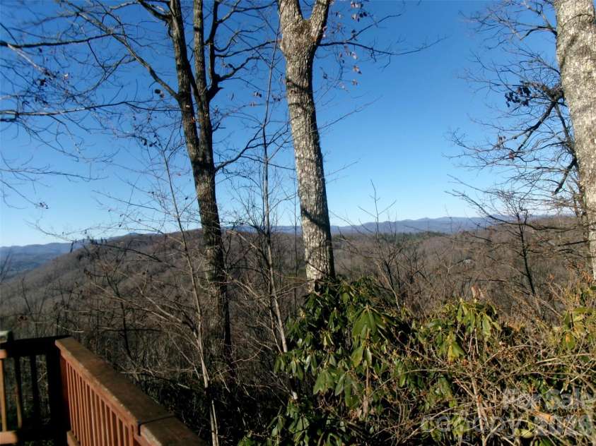 300 Serenity Trail, Rosman, NC 28772.  MLS# CAR4343470, YatesRealty ID 6245. Mountain views from deck