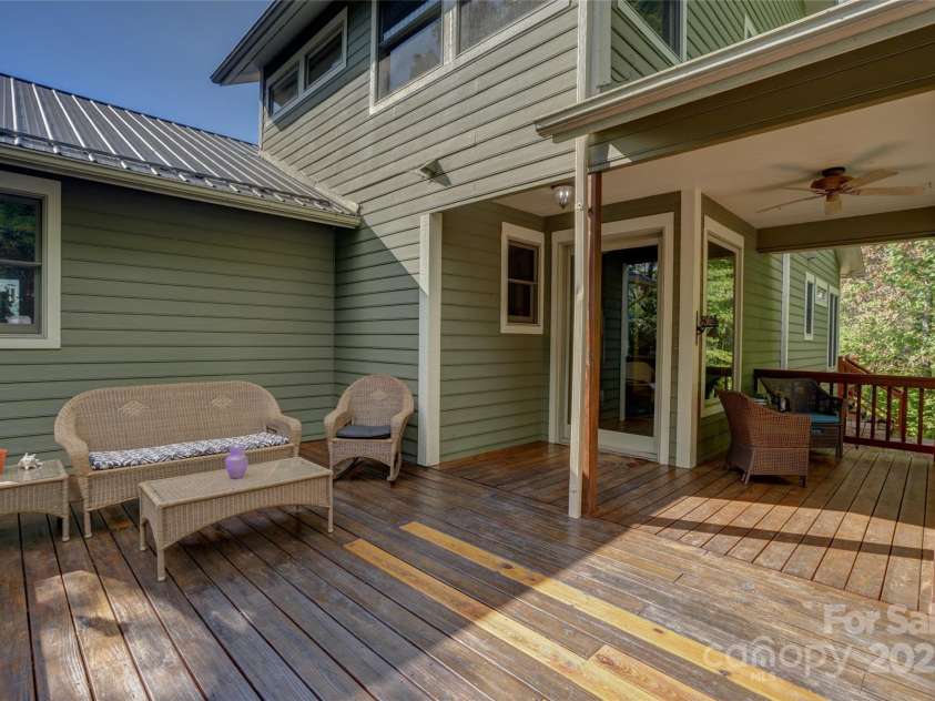 425 Sawmill Creek Road, Bryson City, NC 28713.  MLS# CAR4234274, YatesRealty ID 6247. Front Deck into House