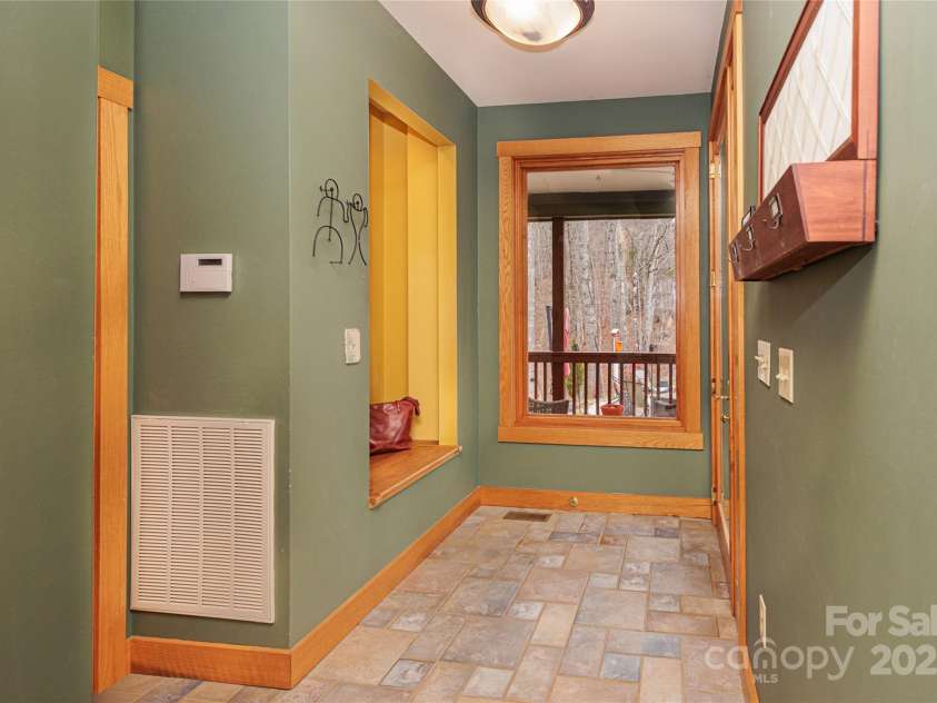 425 Sawmill Creek Road, Bryson City, NC 28713.  MLS# CAR4234274, YatesRealty ID 6247. Front Hall