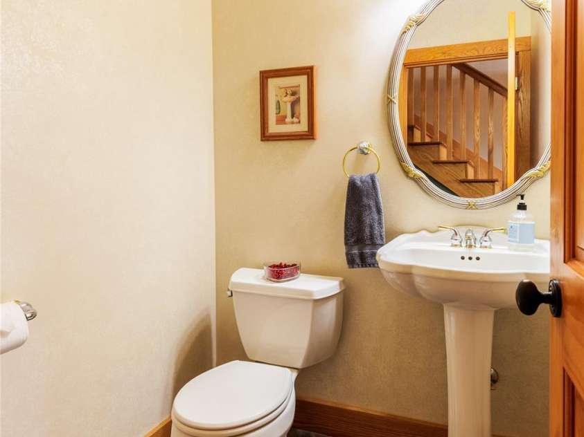 425 Sawmill Creek Road, Bryson City, NC 28713.  MLS# CAR4234274, YatesRealty ID 6247. Half Bath in Front Hall