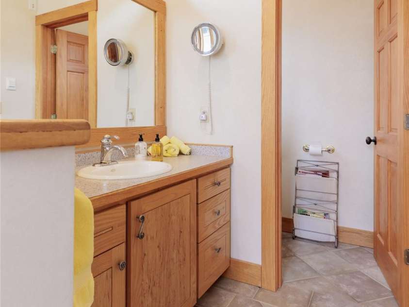 425 Sawmill Creek Road, Bryson City, NC 28713.  MLS# CAR4234274, YatesRealty ID 6247. Primary Bath