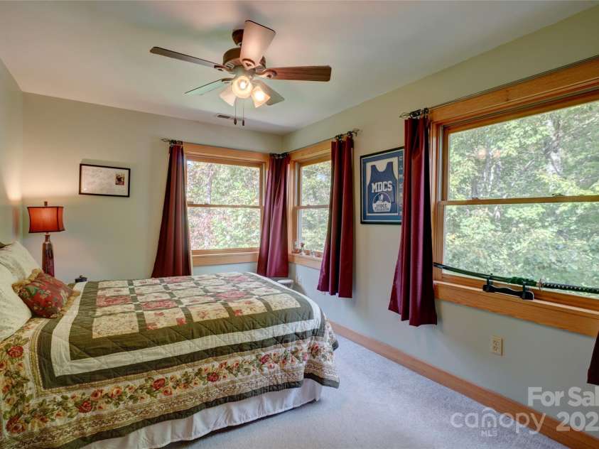 425 Sawmill Creek Road, Bryson City, NC 28713.  MLS# CAR4234274, YatesRealty ID 6247. Upstairs Bedroom 2