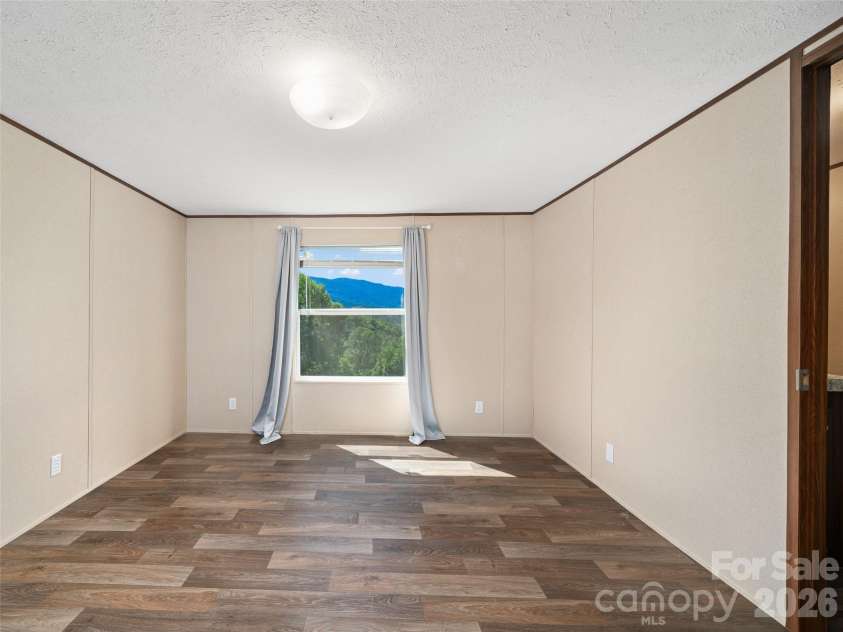 710 Greasy Creek Road, Bakersville, NC 28705.  MLS# CAR4297477, YatesRealty ID 6247. 