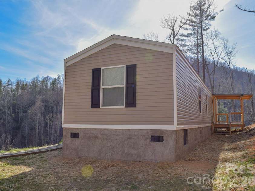 710 Greasy Creek Road, Bakersville, NC 28705.  MLS# CAR4297477, YatesRealty ID 6247. 