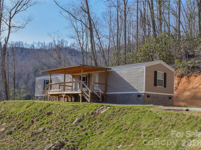 710 Greasy Creek Road, Bakersville, NC 28705.  MLS# CAR4297477, YatesRealty ID 6247. Permanent foundation added