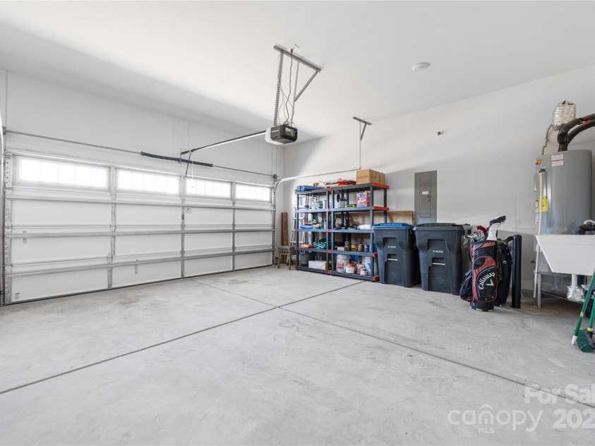 234 Pintail Drive, Monroe, NC 28110.  MLS# CAR4223388, YatesRealty ID 6248. 2 car garage with utility sink