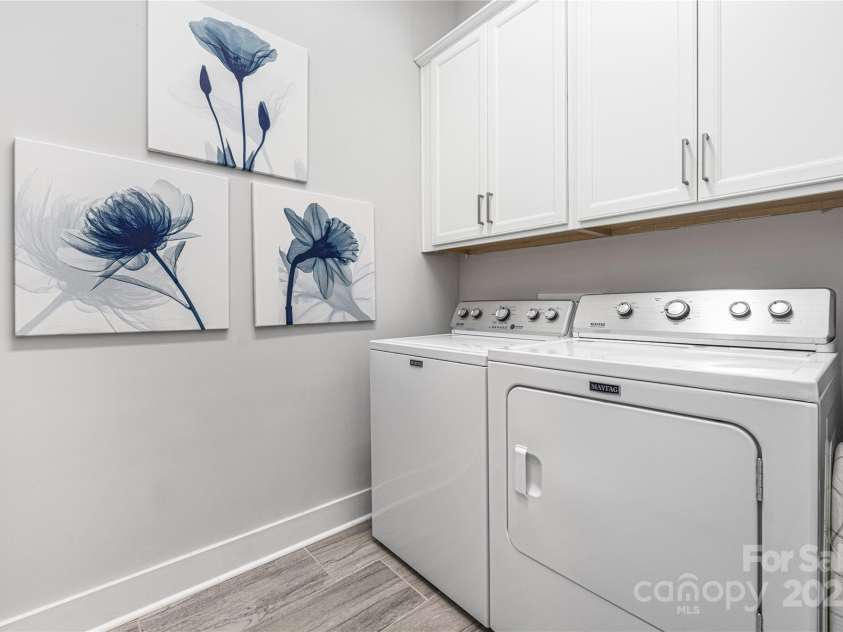 234 Pintail Drive, Monroe, NC 28110.  MLS# CAR4317174, YatesRealty ID 6248. Laundry room with cabinetry