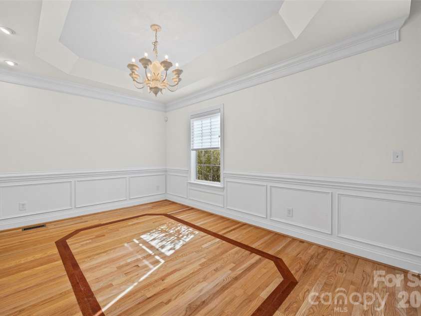 4042 Sunset Ridge Drive, Rock Hill, SC 29732.  MLS# CAR4347059, YatesRealty ID 6249. Contrasting hardwood inlay in dining room