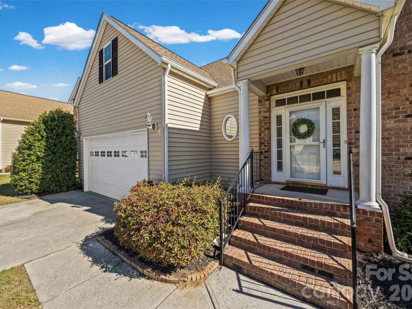 4042 Sunset Ridge Drive, Rock Hill, SC 29732.  MLS# CAR4347059, YatesRealty ID 6249. Front entrance with storm door.