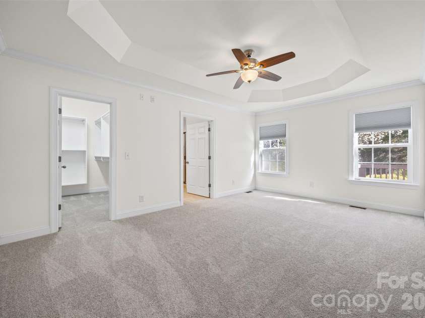 4042 Sunset Ridge Drive, Rock Hill, SC 29732.  MLS# CAR4347059, YatesRealty ID 6249. Large first floor primary bedroom