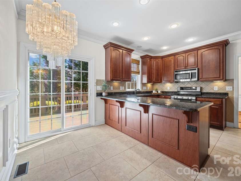 4042 Sunset Ridge Drive, Rock Hill, SC 29732.  MLS# CAR4347059, YatesRealty ID 6249. Sliding doors to deck just off kitchen