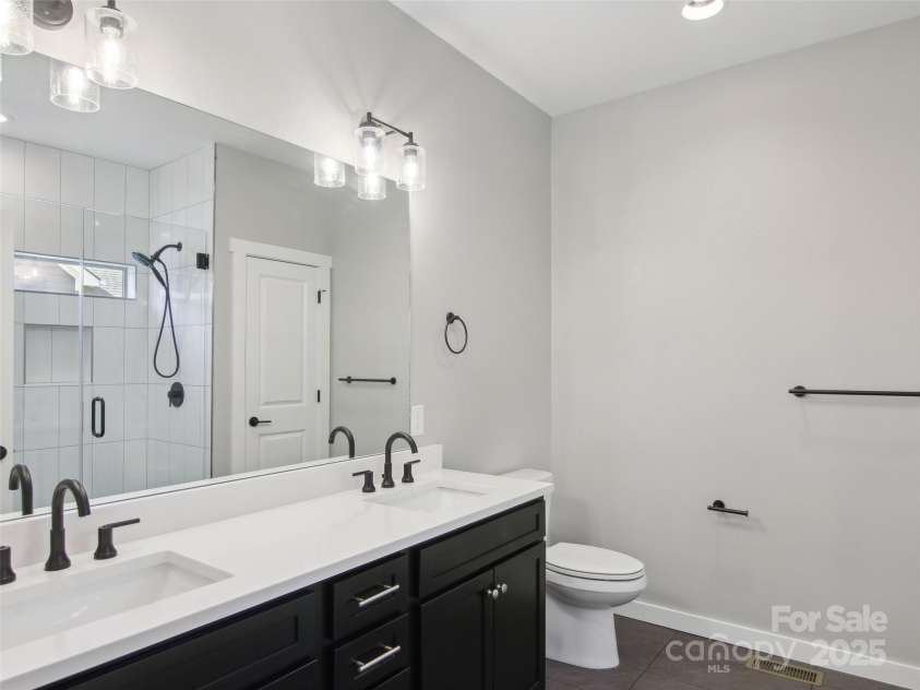 72 Jonestown Road, Woodfin, NC 28804.  MLS# CAR4229228, YatesRealty ID 6249. Primary bathroom