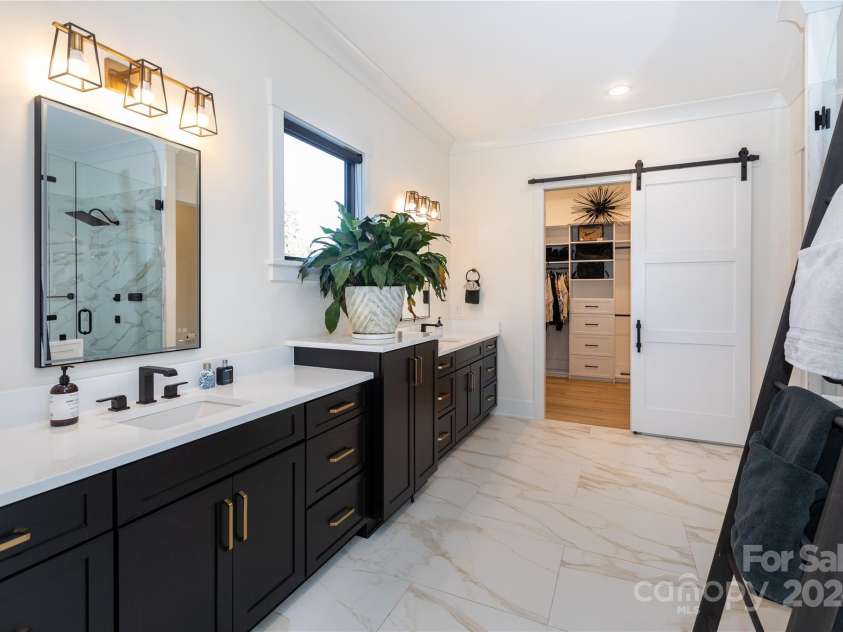 124 Direct Drive, Mooresville, NC 28117.  MLS# CAR4202552, YatesRealty ID 625. Check out all of the vanity space.