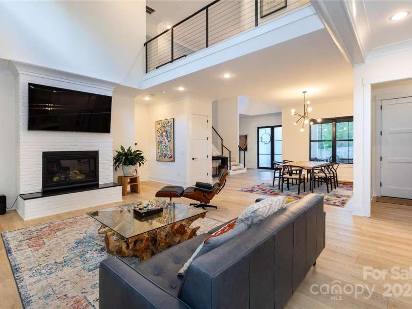 124 Direct Drive, Mooresville, NC 28117.  MLS# CAR4202552, YatesRealty ID 625. Enjoy a fire in the gas log fireplace.