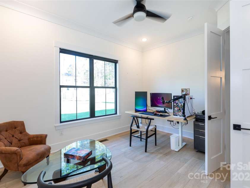 124 Direct Drive, Mooresville, NC 28117.  MLS# CAR4202552, YatesRealty ID 625. Main floor office with a sitting area which is not seen in photo.