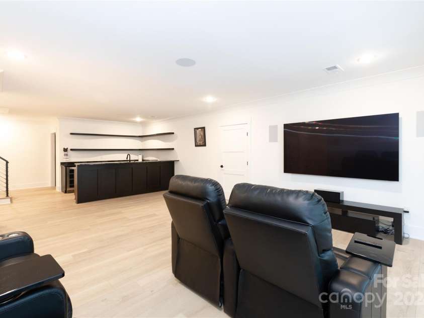 124 Direct Drive, Mooresville, NC 28117.  MLS# CAR4202552, YatesRealty ID 625. Media space w/ Dolby Atmos theater sound.