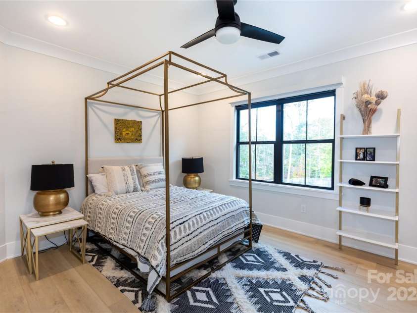 124 Direct Drive, Mooresville, NC 28117.  MLS# CAR4202552, YatesRealty ID 625. Suite bedroom.