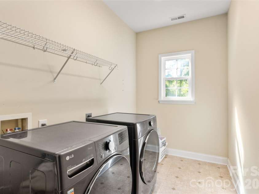 1431 Piper Court, Concord, NC 28025.  MLS# CAR4349971, YatesRealty ID 6250. Large Laundry Room