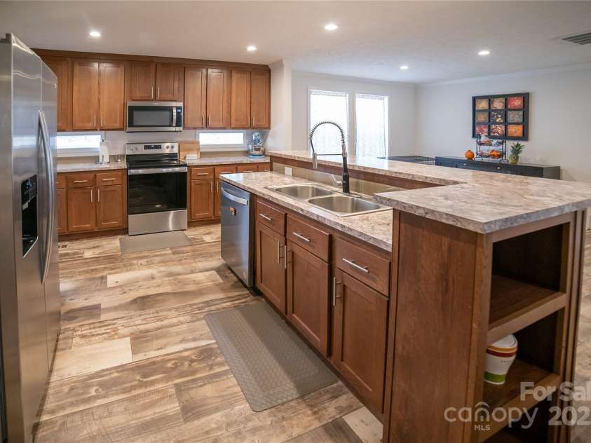 2257 Messer Road, Valdese, NC 28690.  MLS# CAR4209555, YatesRealty ID 6252. Kitchen island with sink