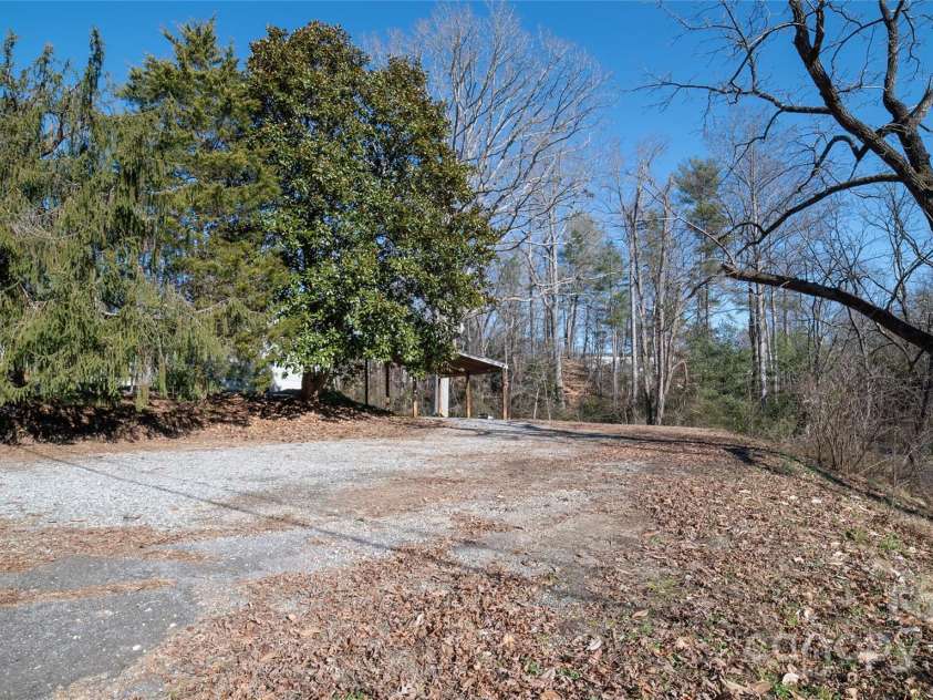 2257 Messer Road, Valdese, NC 28690.  MLS# CAR4209555, YatesRealty ID 6252. Large gravel parking area
