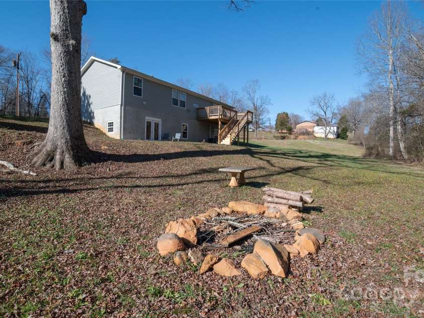 2257 Messer Road, Valdese, NC 28690.  MLS# CAR4209555, YatesRealty ID 6252. Level space in rear of home w firepit