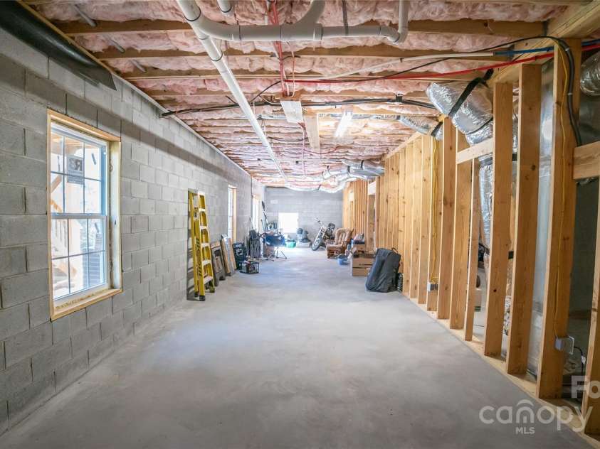 2257 Messer Road, Valdese, NC 28690.  MLS# CAR4209555, YatesRealty ID 6252. Loads of natural light from walk out basement windows and french doors