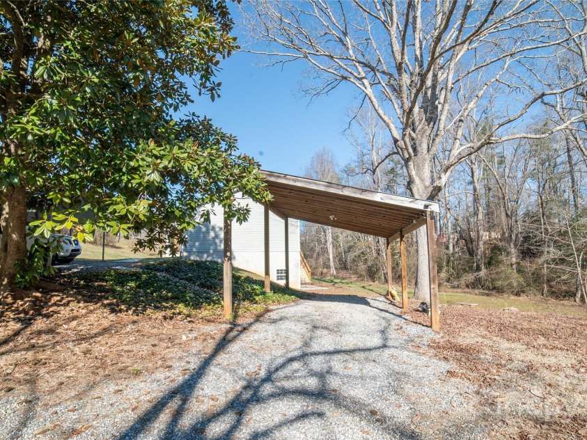 2257 Messer Road, Valdese, NC 28690.  MLS# CAR4209555, YatesRealty ID 6252. Lower carport near basement doors