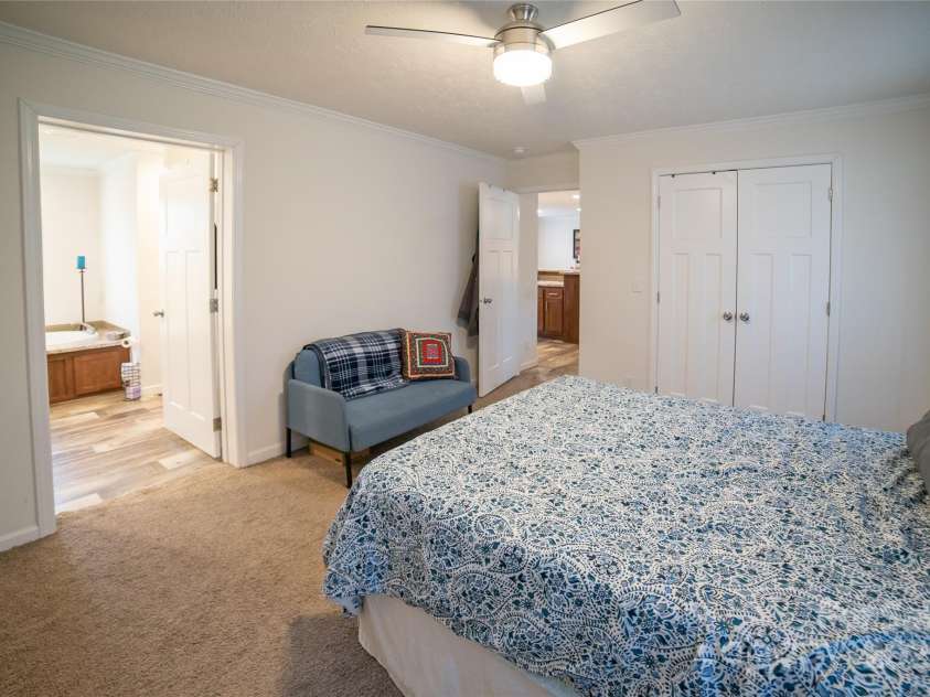 2257 Messer Road, Valdese, NC 28690.  MLS# CAR4209555, YatesRealty ID 6252. Primary bedroom w bath in background