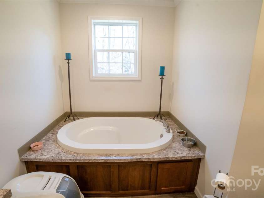 2257 Messer Road, Valdese, NC 28690.  MLS# CAR4209555, YatesRealty ID 6252. Soaking tub in primary bathroom