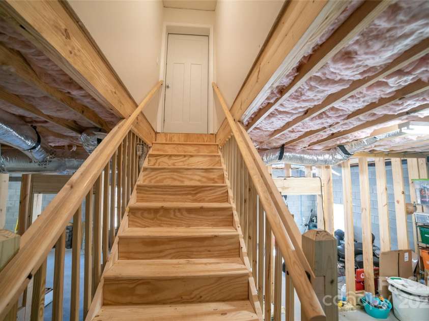 2257 Messer Road, Valdese, NC 28690.  MLS# CAR4209555, YatesRealty ID 6252. Staircase to basement