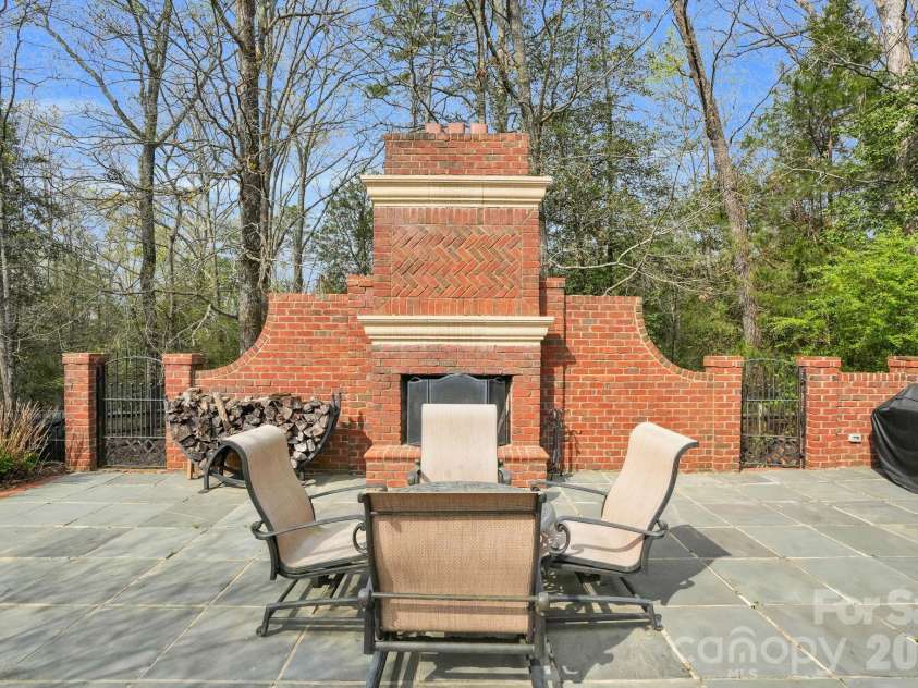 312 Old Hickory Court, Fort Mill, SC 29715.  MLS# CAR4358551, YatesRealty ID 6253. Outdoor Fireplace