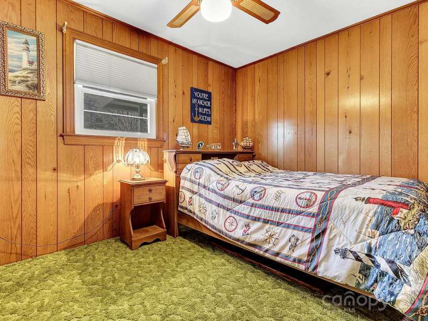 44 Tuttle Road, Hendersonville, NC 28792.  MLS# CAR4318659, YatesRealty ID 6261. Third bedroom on main level.