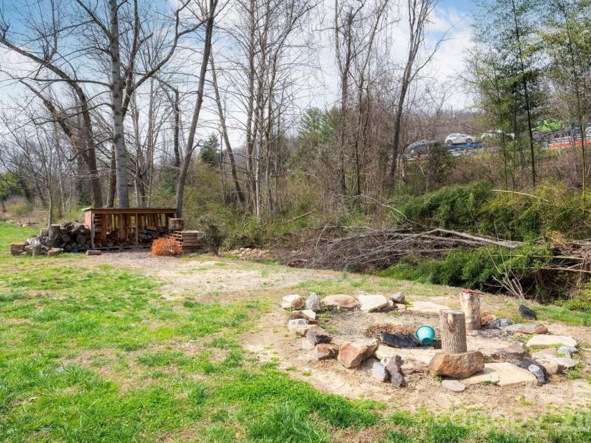 107 Loch Haven Road, Swannanoa, NC 28778.  MLS# CAR4360804, YatesRealty ID 6267. Community Fire pit area.