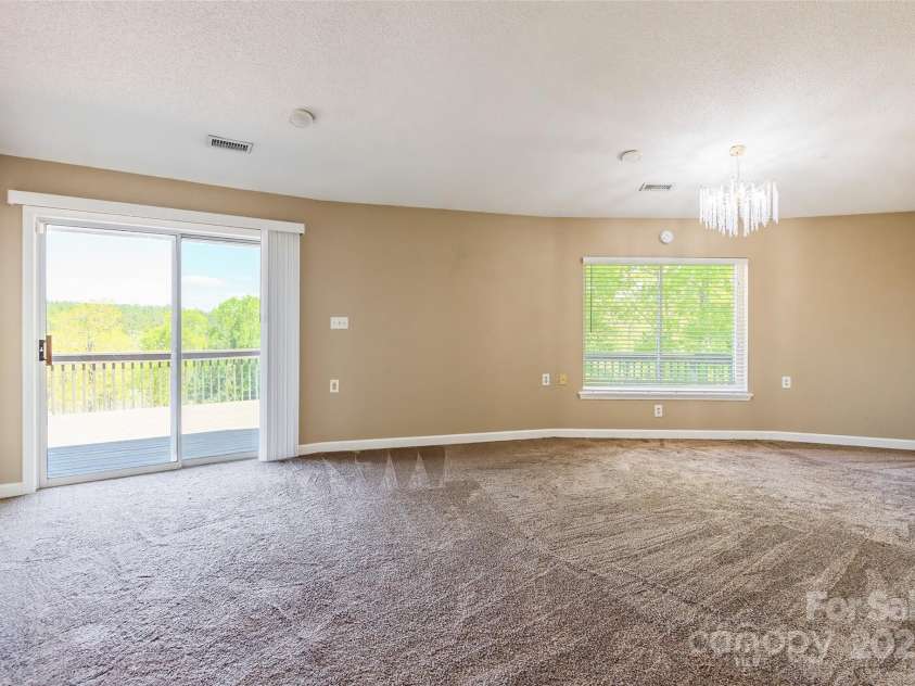 1308 Twin Oaks Drive, Chester, SC 29706.  MLS# CAR4245372, YatesRealty ID 6267. Primary bedroom overlooks the water