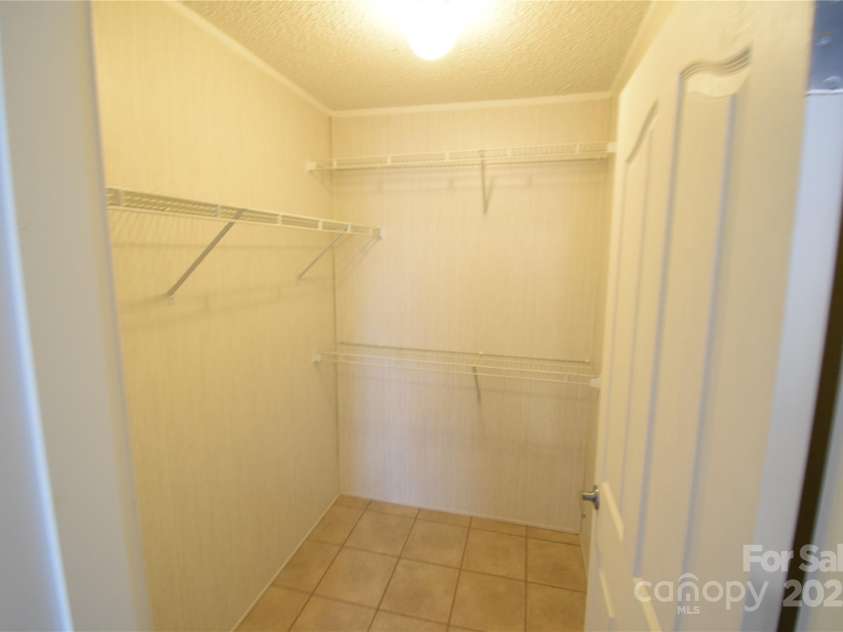 121 Silver Fox Court, Mount Holly, NC 28120.  MLS# CAR4241766, YatesRealty ID 6269. Bedroom 2 Walk in closet