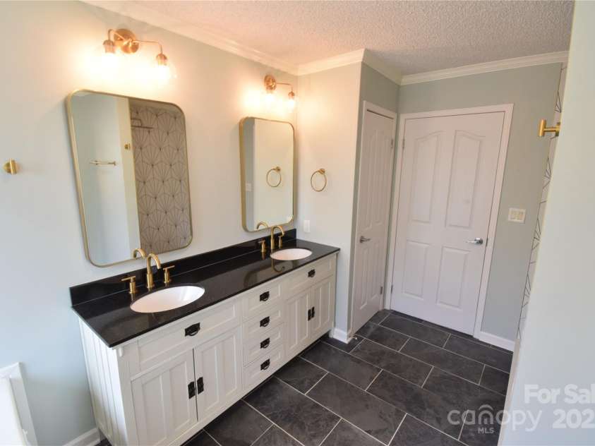 121 Silver Fox Court, Mount Holly, NC 28120.  MLS# CAR4241766, YatesRealty ID 6269. Dual Sink Vanity