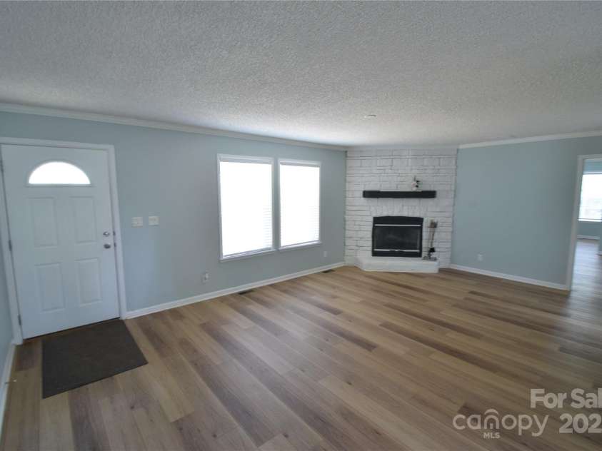 121 Silver Fox Court, Mount Holly, NC 28120.  MLS# CAR4241766, YatesRealty ID 6269. Large Family Room