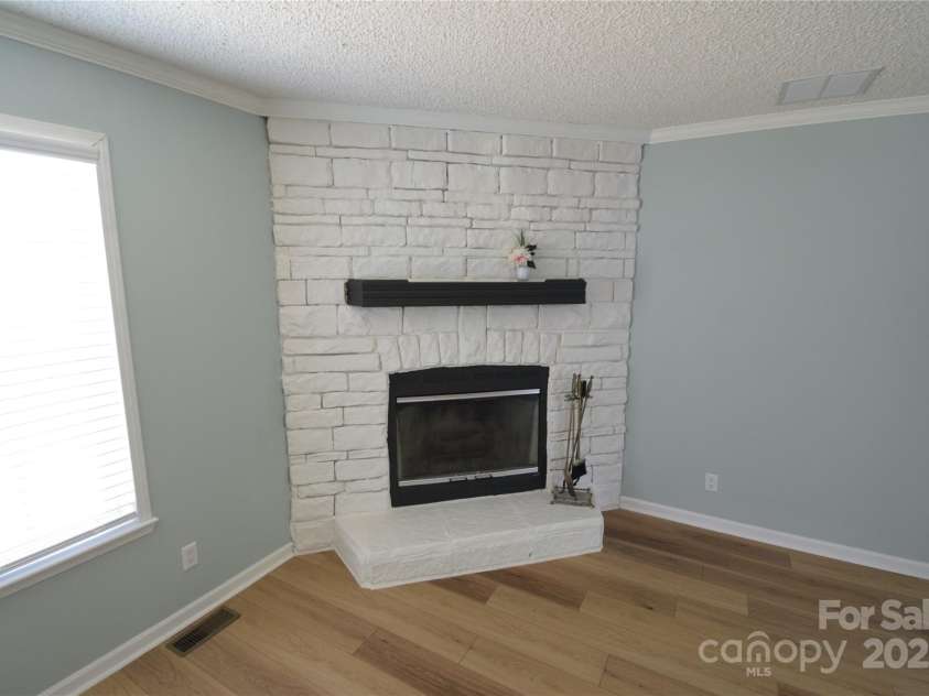 121 Silver Fox Court, Mount Holly, NC 28120.  MLS# CAR4241766, YatesRealty ID 6269. Wood Burning Fireplace